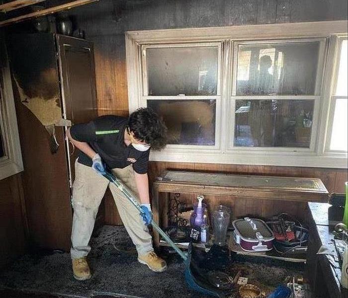 a house being cleaned after a fire